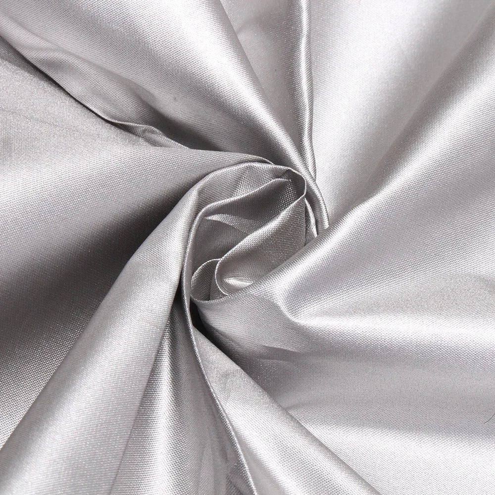 Furniture cover shedding rainwater on a patio set