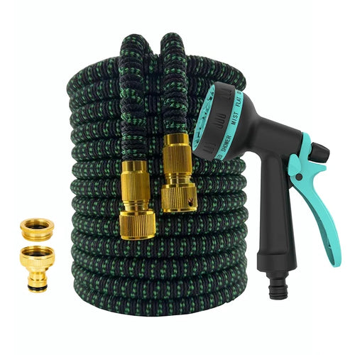 Expandable garden hose coiled with brass fittings and spray nozzle