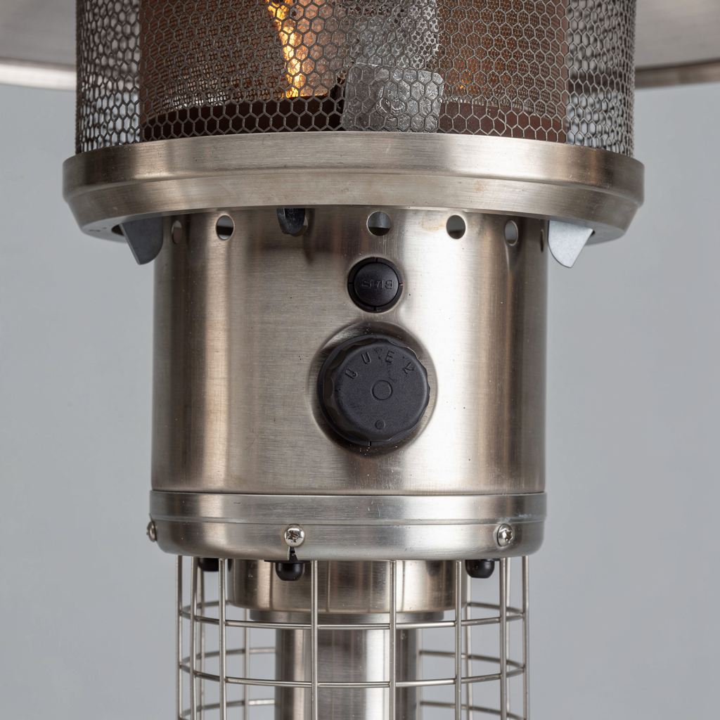 Close-up of the patio heater's control knob, igniter and mesh flame guard